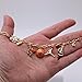 Gold Tone Basketball Charm Necklace with Bow, Pearl, Megaphone, 16-19 Inch with 3 Inch Extension