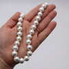 Timeless Classic Simulated Pearls Knotted Strand Necklace With Easy Connect Clasp (10mm, 19", White Silver Tone)
