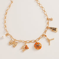 Gold Tone Basketball Charm Necklace with Bow, Pearl, Megaphone, 16-19 Inch with 3 Inch Extension