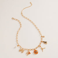 Gold Tone Basketball Charm Necklace with Bow, Pearl, Megaphone, 16-19 Inch with 3 Inch Extension