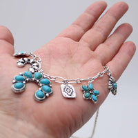 Western Squash Blossom Charm Necklace, Turquoise Howlite Stone, Silver Tone, 7 Charms, 20"+3" Extender