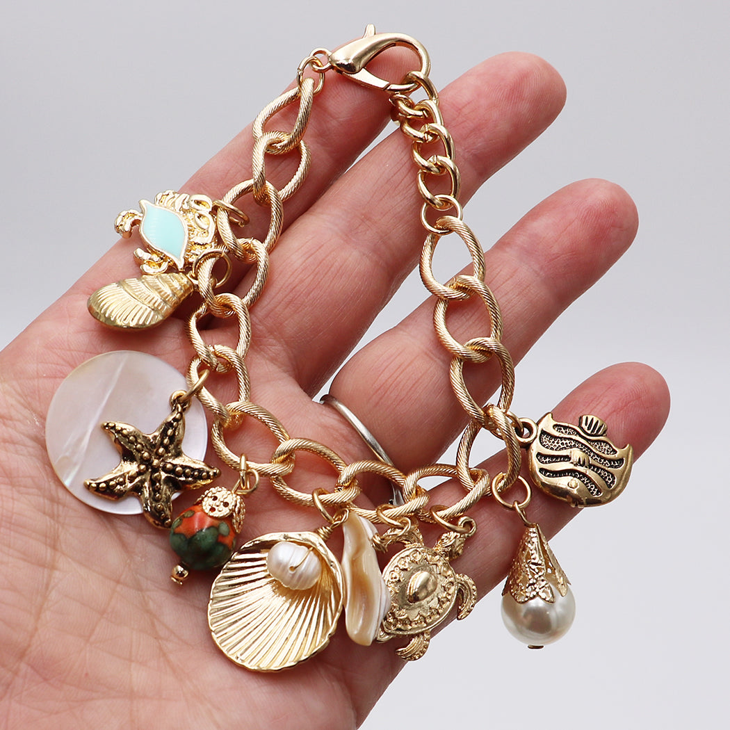Stunning Natural Seashells Mixed With Turtle Starfish Dangling Faux Pearl Charms On Polished Gold Tone Textured Cable Link Chain (Charm Bracelet, 6.25"+1" Extender)
