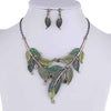 UnbeLeafable Vine and Leaves Crystal Statement Necklace Earrings Set, 14"+3 Extender (Shades Of Green Leaves Burnished Gold Tone)
