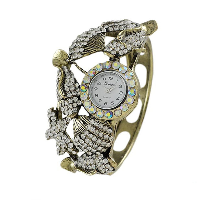 Mermaid Chic Burnished Gold Tone Crystal Rhinestone Encrusted Starfish Seashell Ocean Creatures Bangle Bracelet Hinged Cuff Watch, 7"